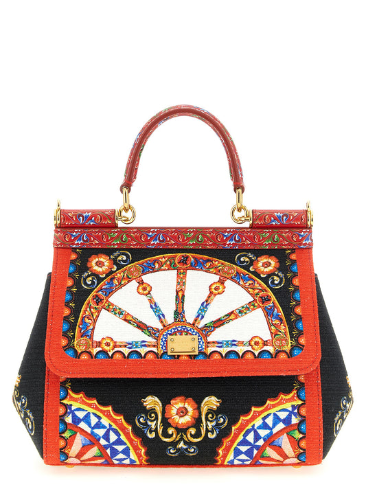 Flap Handbag by Dolce & Gabbana for women in stretch cotton multicolor & print features a refined silhouette, showcasing a secure snap & flap, organized , and versatile shoulder-strap, adjustable-strap & handle for a refined finish.