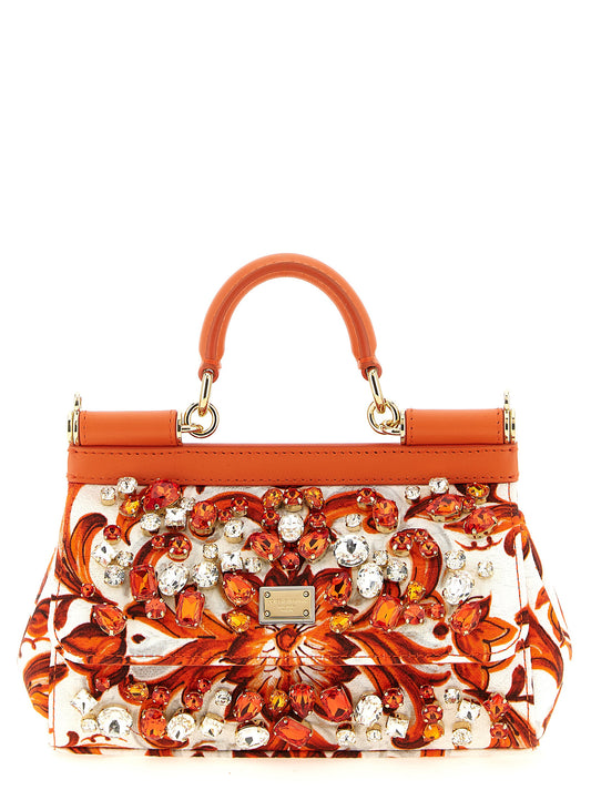Mini Handbag by Dolce & Gabbana for women in cotton & leather gold, orange & print features an refined silhouette, showcasing a secure , ample , and versatile shoulder-strap & adjustable-strap for a sophisticated refined aesthetic.