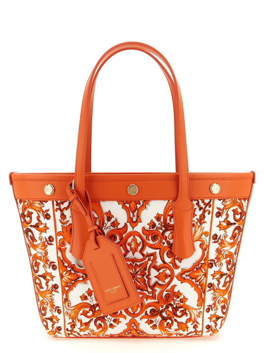 Shopper Tote Clutch Bag by Dolce & Gabbana for women in calfskin suede leather gold, orange & print showcases a statuesque Atene Maiolica Calfskin Suede Leather Shopper Tote Clutch Bag design, featuring a secure snap & button, ample , and versatile handle for a statuesque finish.
