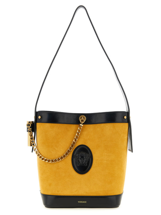 Small Shoulder Bucket Bag by Versace for women in calfskin leather bicolour & yellow features a statuesque silhouette, showcasing a secure magnetic and statuesque with versatile shoulder-strap & handle for a statuesque finish.