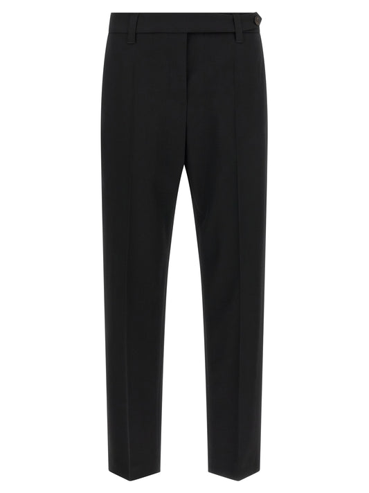 Trousers by Brunello Cucinelli for women in virgin wool black presents a smart silhouette, meticulously detailed with a smart tapered-leg, a smart long, and a smart .