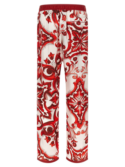 Casual Pants by Dolce & Gabbana for men in silk twill multicolor, red, signature & print features an sophisticated and straight-leg & wide with a precise long, creating a sophisticated and sophisticated silhouette.