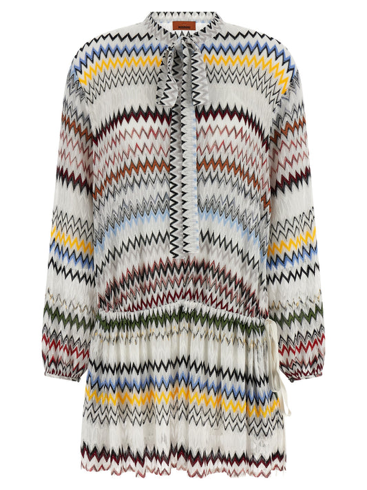 Dress by Missoni for women in viscose cotton white, patterned & chevron features an sultry silhouette defined by a v-neck neckline and , falling to an sultry short mini for a sultry look.