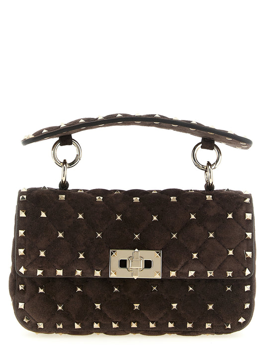 Small Shoulder Flap Bag by Valentino Garavani for women in suede calfskin leather brown showcases a enviable silhouette, artfully detailed with a secure flap, organized , and versatile shoulder-strap, detachable-strap & handle for a enviable look.