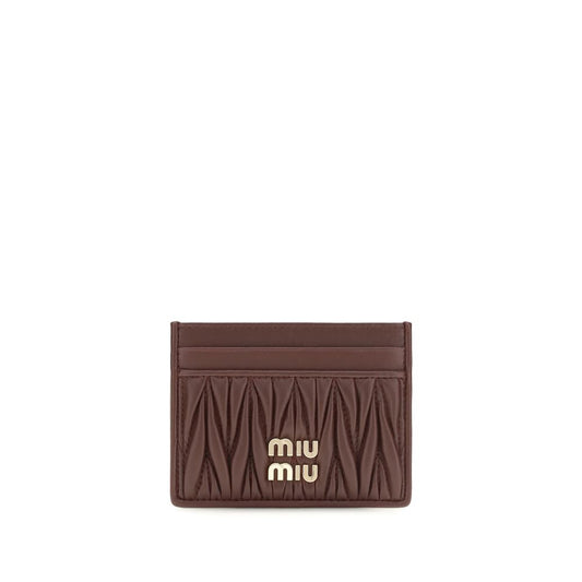 Cardholder Wallet by Miu Miu for women in leather & metal bordeaux features a streamlined silhouette, showcasing the streamlined Miu Leather & Metal Cardholder Wallet design with sophisticated card-organization compact-design for a premium look.
