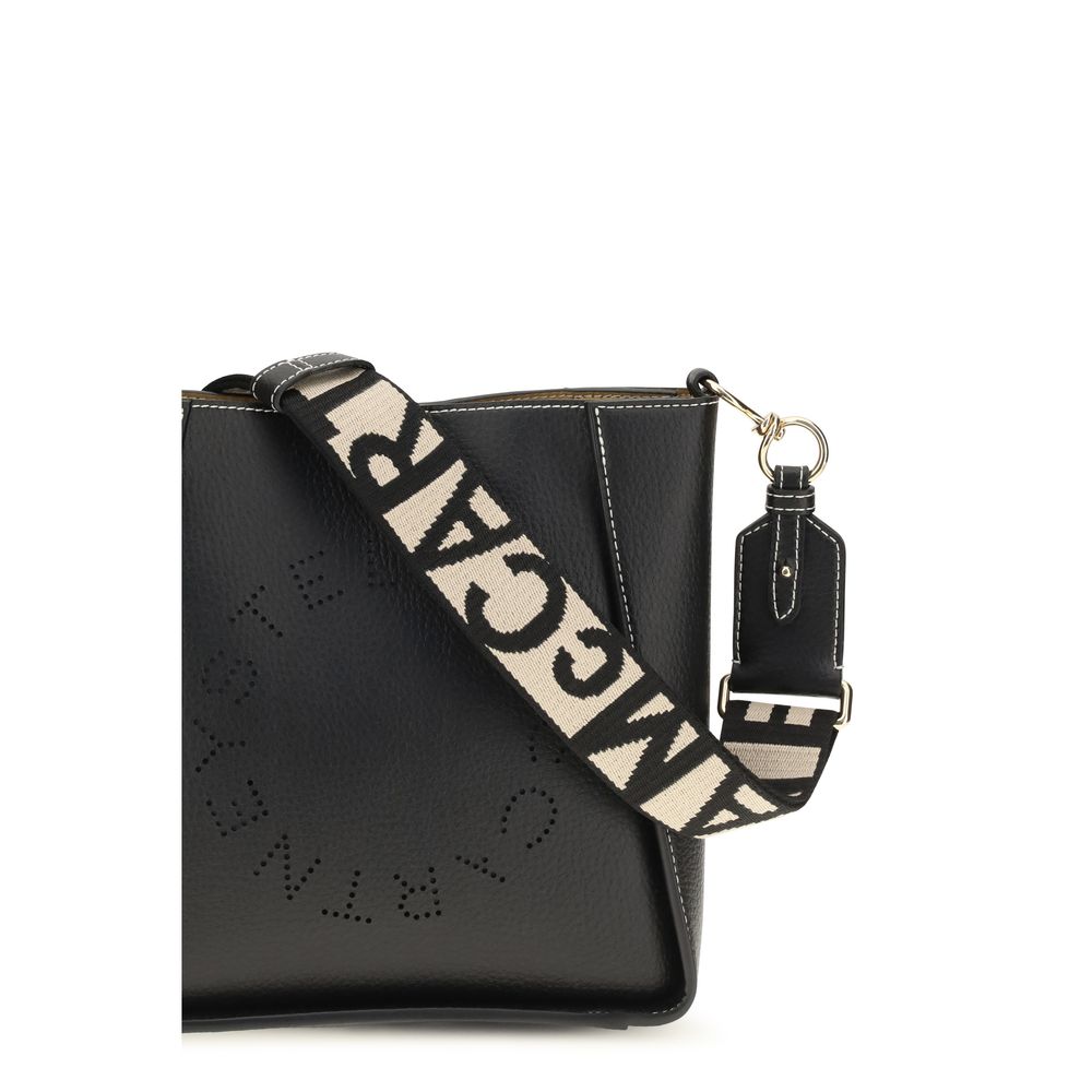 Mini Shoulder Bag by Stella McCartney for women in polyethylene & polyurethane black & jacquard showcases a statuesque silhouette, artfully detailed with a secure magnetic & button, organized , and versatile shoulder-strap for a statuesque look.