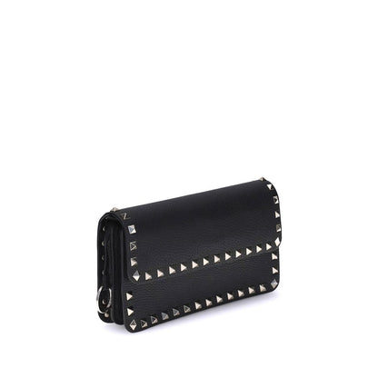 Cardholder Wallet by Valentino Garavani for women in bos taurus calf leather black showcases a refined silhouette, artfully detailed with the signature style of the Rockstud Bos Taurus Calf Leather Cardholder Wallet and functional card-organization chain.