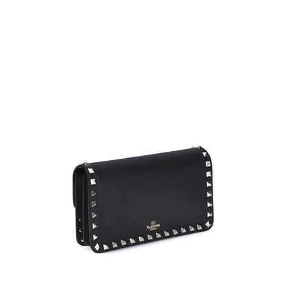 Cardholder Wallet by Valentino Garavani for women in bos taurus calf leather black presents a streamlined silhouette, showcasing the sophisticated design of the Rockstud Bos Taurus Calf Leather Cardholder Wallet collection with functional card-organization chain.