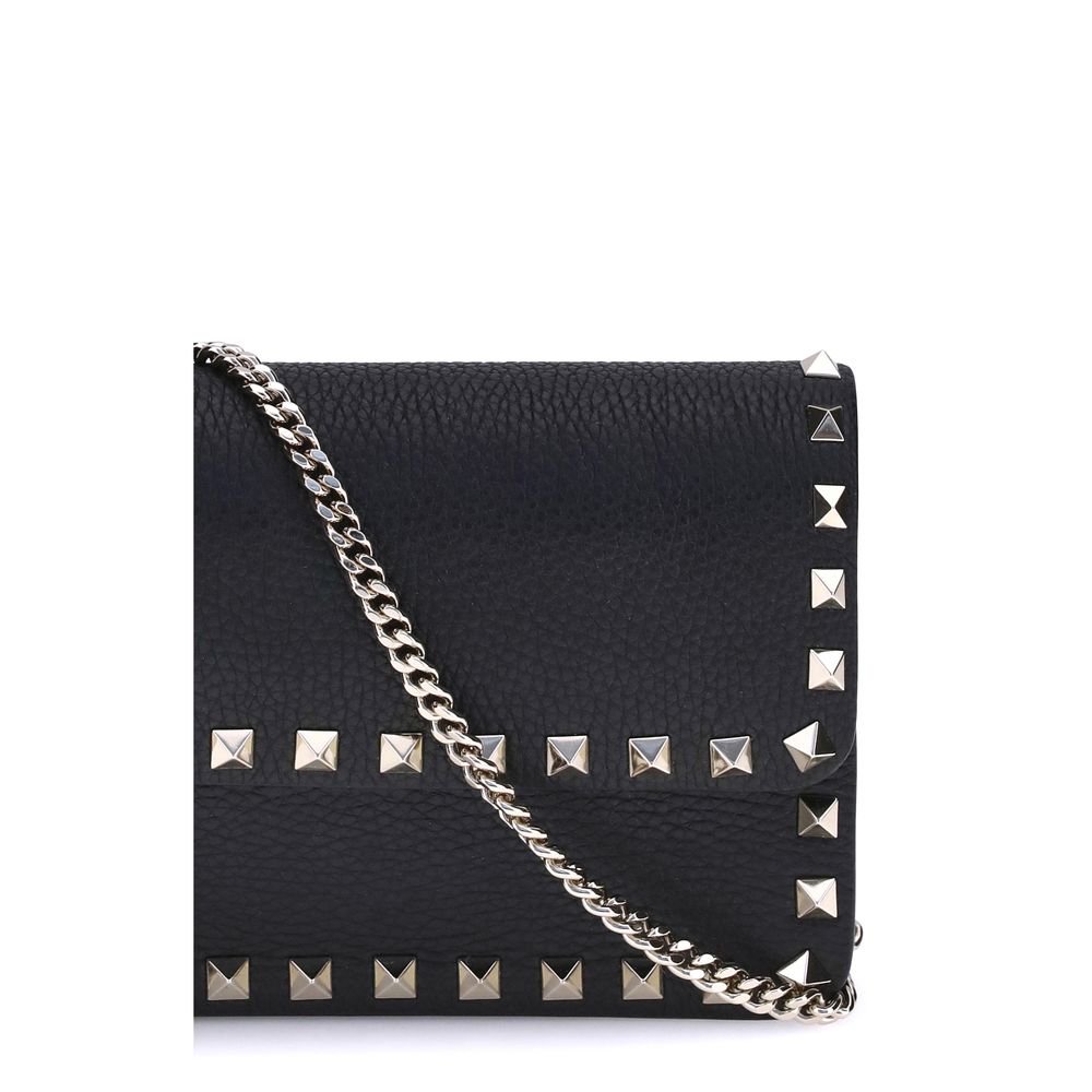 Cardholder Wallet by Valentino Garavani for women in bos taurus calf leather black features a streamlined silhouette, showcasing the streamlined Rockstud Bos Taurus Calf Leather Cardholder Wallet design with sophisticated card-organization chain for a premium look.