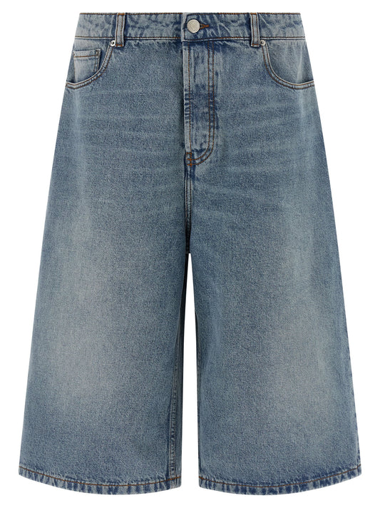 Denim Shorts by Ami Paris for men in cotton denim blue presents a utilitarian silhouette, showcasing a utilitarian flared & wide with a short and .