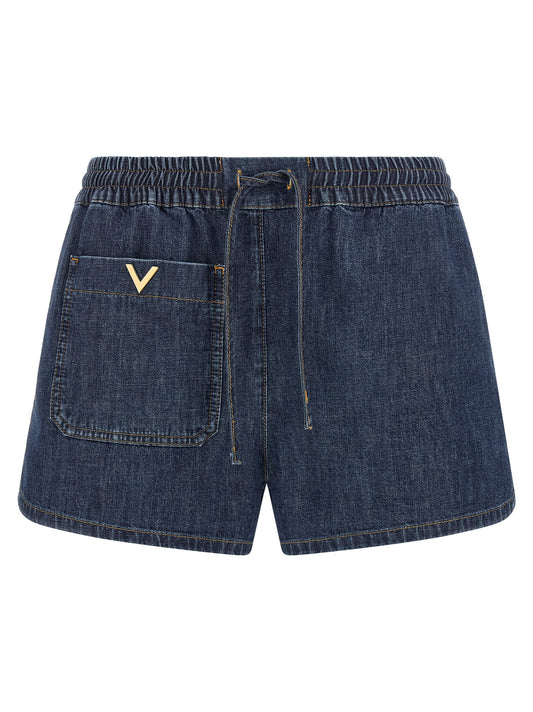 Denim Shorts by Valentino Garavani for women in denim cotton blue & gold presents a contemporary silhouette, featuring a contemporary and short with a contemporary for a sophisticated summer look.