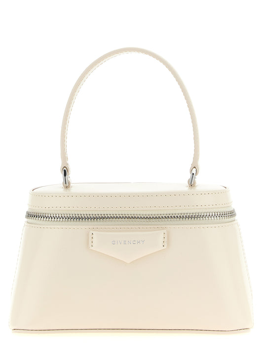 Crossbody Box Handbag by Givenchy for women in nappa leather white features a transformative sophistication silhouette, showcasing a secure zipper, ample , and versatile crossbody-strap, shoulder-strap & handle for a transformative sophistication look.