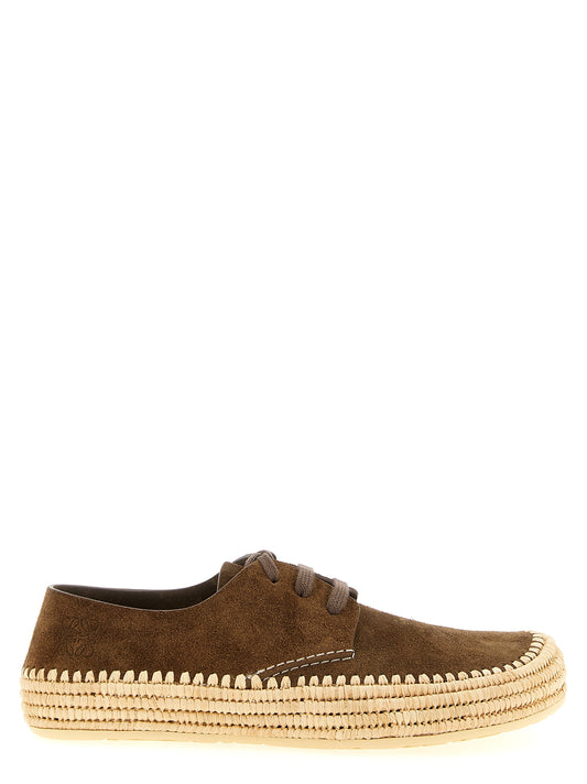 Espadrille Espadrilles Loafer Lace-Up Shoes by Loewe for men in raffia & suede calfskin leather brown, natural, patterned & signature features an effortless chic silhouette, showcasing the Men's Raffia & Suede Calfskin Leather Espadrille Espadrilles Loafer Lace-Up Shoes design with an effortless chic and a for a effortless chic look.