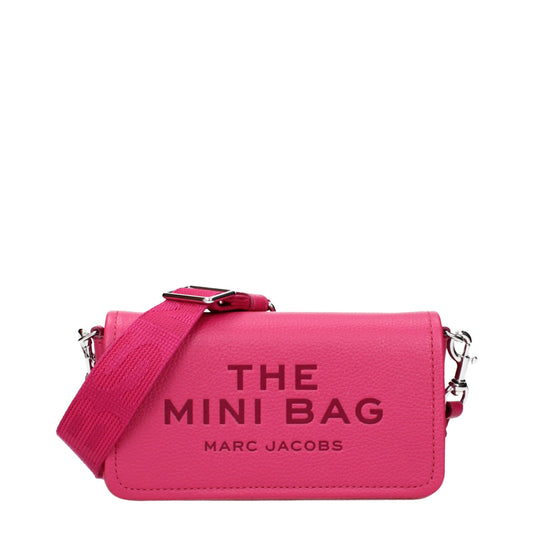 Crossbody Handbag by Marc Jacobs for women in leather fuchsia & pink features a transformative elegance silhouette, showcasing a secure , organized , and versatile crossbody-strap & adjustable-strap for a transformative elegance look.