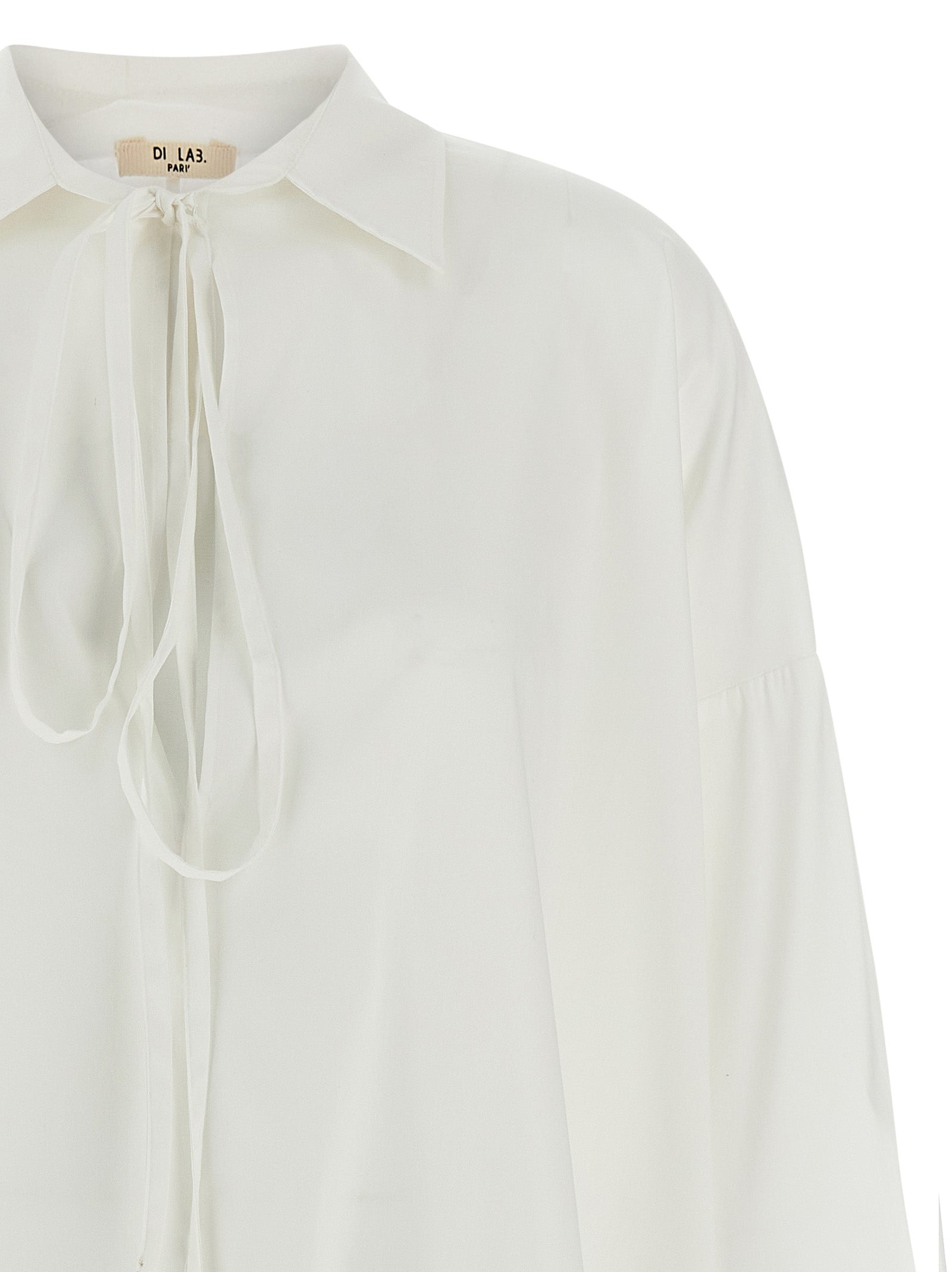 Blouse by DI.LA3 PARI' for women in silk white features an architectural silhouette with a refined and elegant for a architectural look.