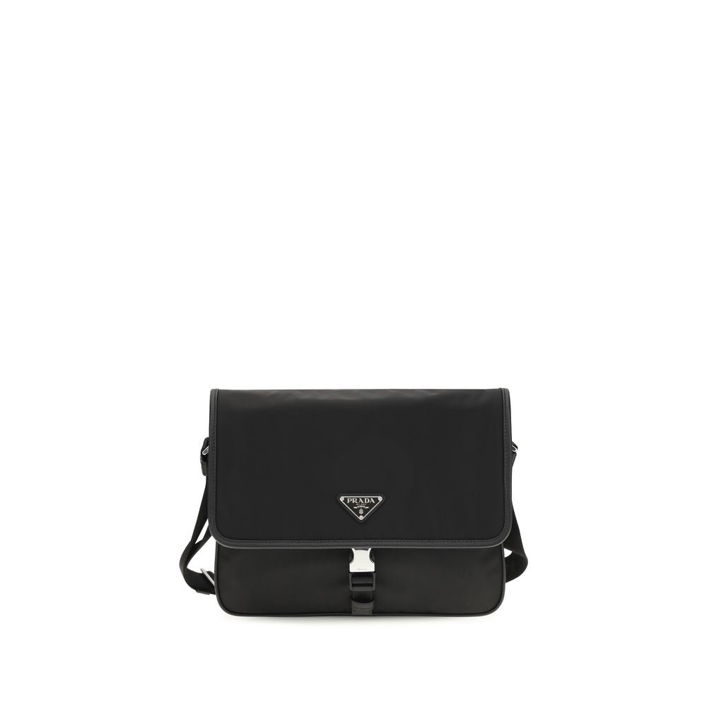 Shoulder Flap Bag by Prada for men in stretch polyester & viscose black showcases a statuesque silhouette, artfully detailed with a secure snap, flap & zipper, organized , and versatile shoulder-strap & adjustable-strap for a statuesque look.