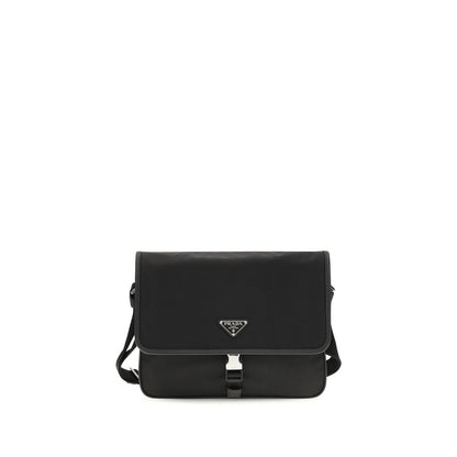 Shoulder Flap Bag by Prada for men in stretch polyester & viscose black showcases a statuesque silhouette, artfully detailed with a secure snap, flap & zipper, organized , and versatile shoulder-strap & adjustable-strap for a statuesque look.