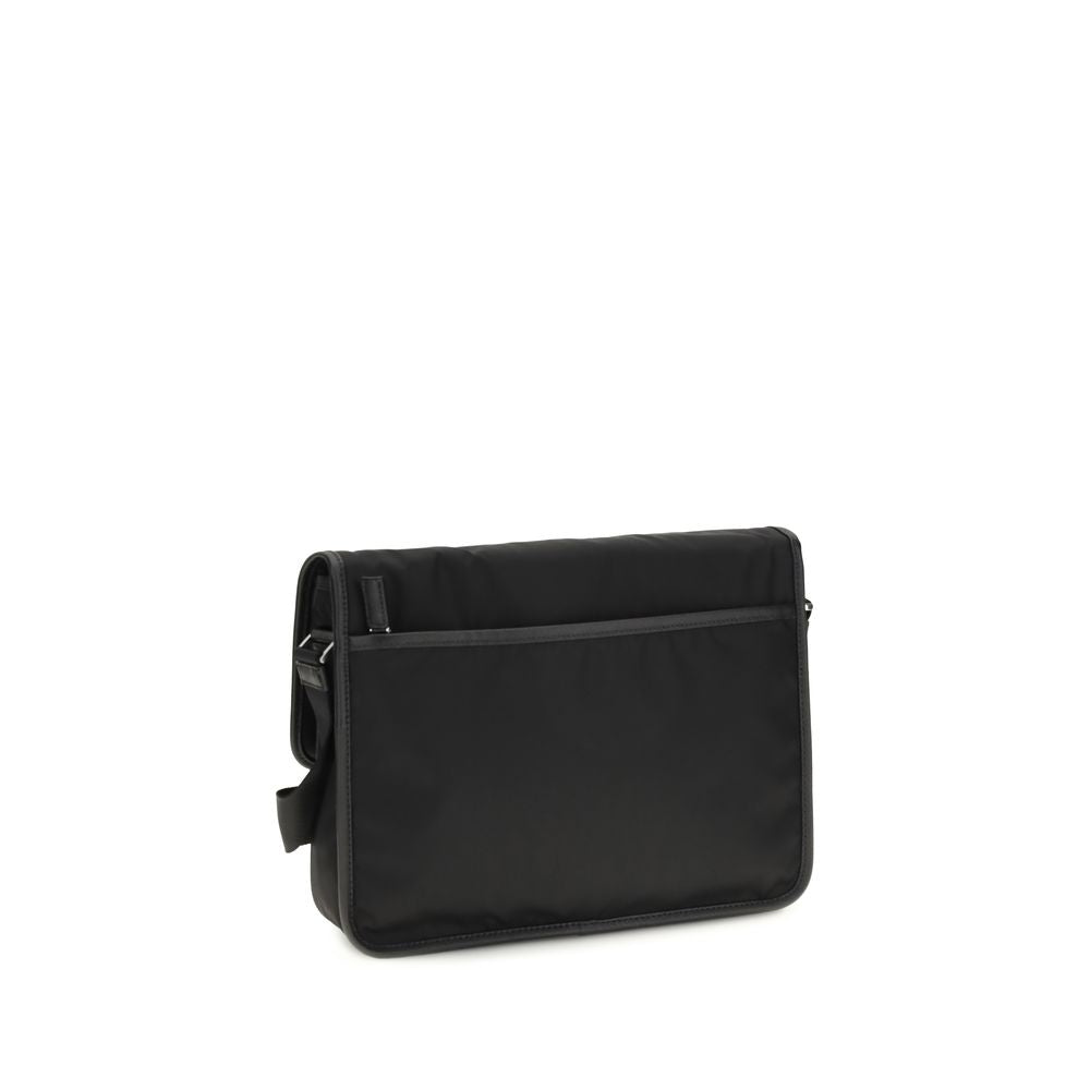 Shoulder Flap Bag by Prada for men in stretch polyester & viscose black presents a statuesque silhouette, showcasing a secure snap, flap & zipper and statuesque with versatile shoulder-strap & adjustable-strap for a sophisticated look.