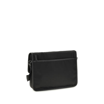 Shoulder Flap Bag by Prada for men in stretch polyester & viscose black presents a statuesque silhouette, showcasing a secure snap, flap & zipper and statuesque with versatile shoulder-strap & adjustable-strap for a sophisticated look.