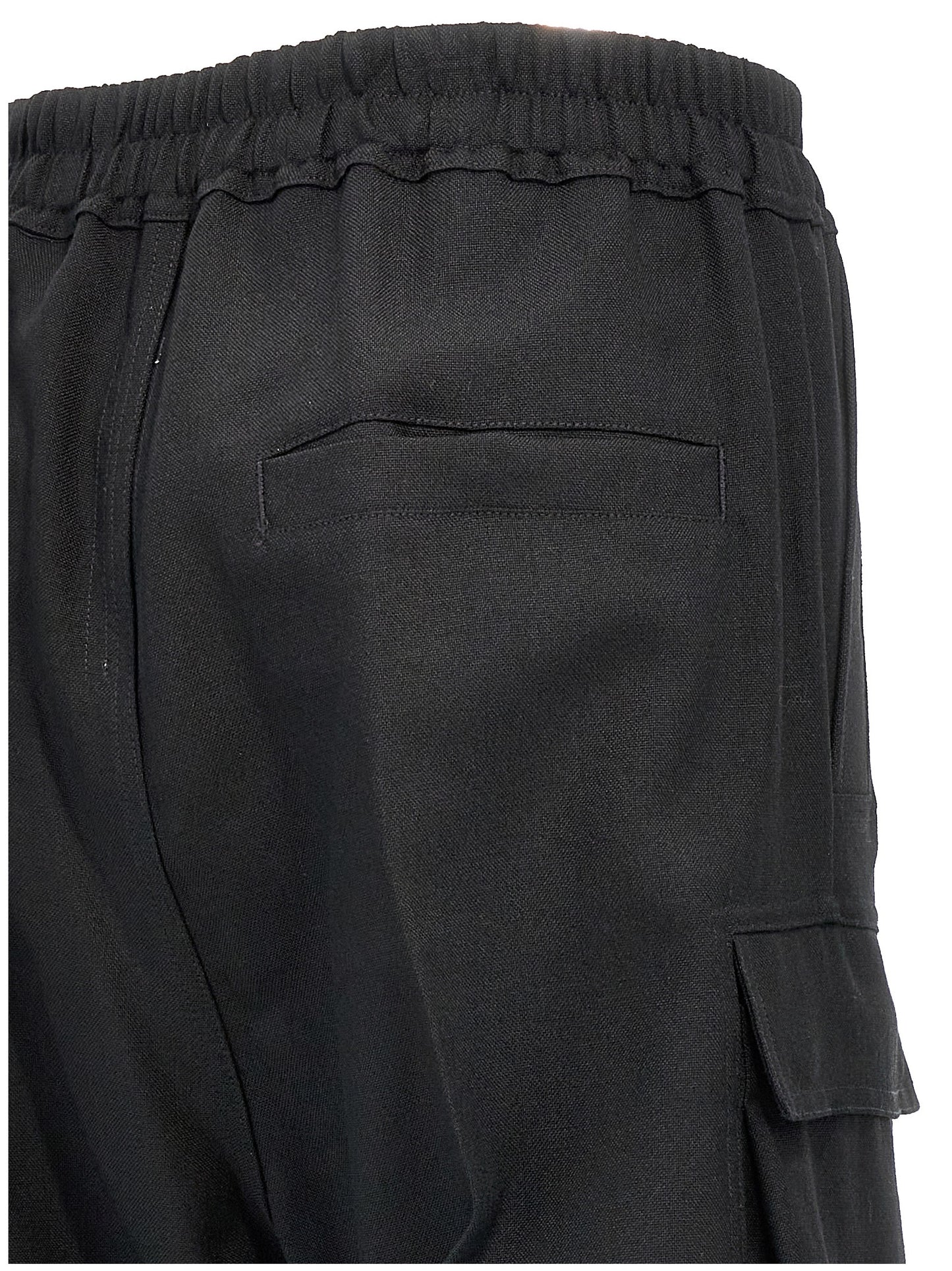 Cargo Pants by Rick Owens for women in wool black features an smart casual flared, relaxed-fit & wide and long, expertly tailored with a and smart casual utilitarian details for a sophisticated look.