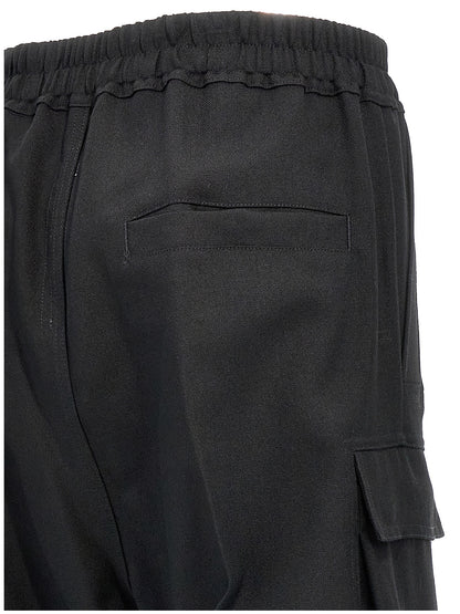 Cargo Pants by Rick Owens for women in wool black features an smart casual flared, relaxed-fit & wide and long, expertly tailored with a and smart casual utilitarian details for a sophisticated look.