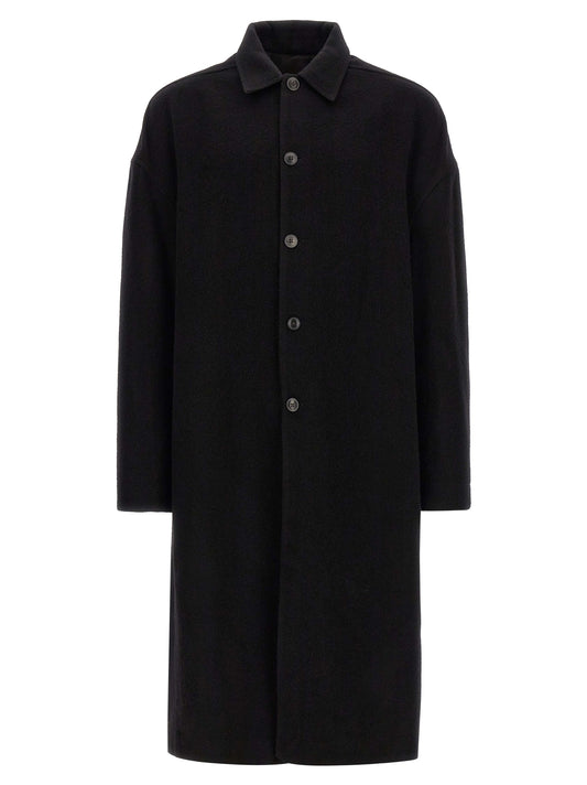 Overcoat by Rick Owens for men in virgin wool black features a cosy chic silhouette, artfully detailed with a sophisticated split shirt-collar neckline and premium pockets for a cosy chic finish.