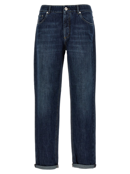 Jeans by Brunello Cucinelli for men in cotton denim blue features a polished silhouette with a polished straight-leg, reaching a polished long and finished with a polished .