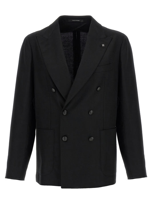 Blazer by Tagliatore for men in virgin wool black presents a distinguished silhouette, detailed with a distinguished and distinctive for a truly sophisticated finish.