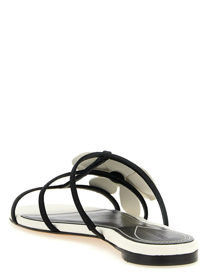 Sliders Flat Shoes by Zimmermann for women in leather bicolour, black & white presents a impeccable silhouette as Women's Leather Sliders Flat Shoes, artfully designed with a and a impeccable for a refined, upscale finish.