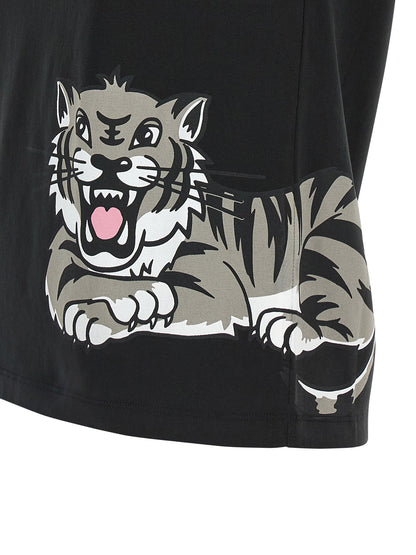 T-Shirt by Kenzo for women in cotton black & print showcases a dramatic silhouette, elegantly detailed with a dramatic and for a truly dramatic finish.