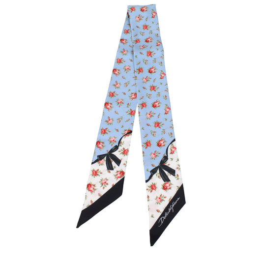 Scarf by Dolce & Gabbana for women in silk light-blue presents a cosy silhouette, artfully capturing the sophisticated design and premium aesthetic of the Silk Scarf.