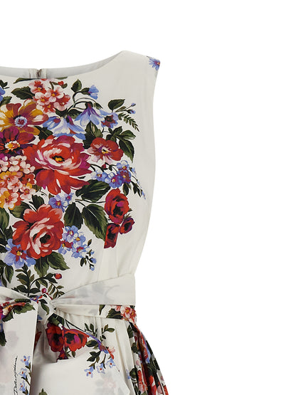 Dress by Dolce & Gabbana for women in cotton white & print features an cute silhouette, detailed with a and boat neckline that elegantly flows into a cute midi.
