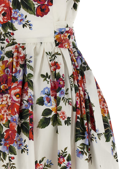 Dress by Dolce & Gabbana for women in cotton white & print showcases a striking silhouette, elegantly detailed with a , refined , and a striking midi for a striking finish.
