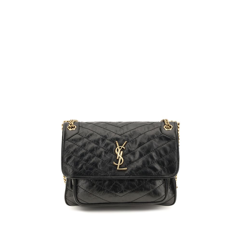 2-in-1 Shoulder & Crossbody Flap Bag by Saint Laurent for women in bos taurus calf leather black, chevron & signature features a stately silhouette, showcasing a secure flap, ample built-in-compartments, and stately crossbody-strap & shoulder-strap for a stately finish.