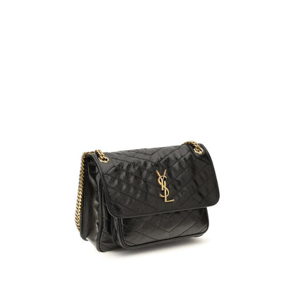 2-in-1 Shoulder & Crossbody Flap Bag by Saint Laurent for women in bos taurus calf leather black, chevron & signature features a effortless chic silhouette with a secure flap, ample built-in-compartments, and versatile crossbody-strap & shoulder-strap for a effortless chic finish.