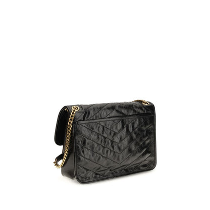 2-in-1 Shoulder & Crossbody Flap Bag by Saint Laurent for women in bos taurus calf leather black, chevron & signature presents a statuesque silhouette, showcasing a secure flap and statuesque built-in-compartments with versatile crossbody-strap & shoulder-strap for a sophisticated look.