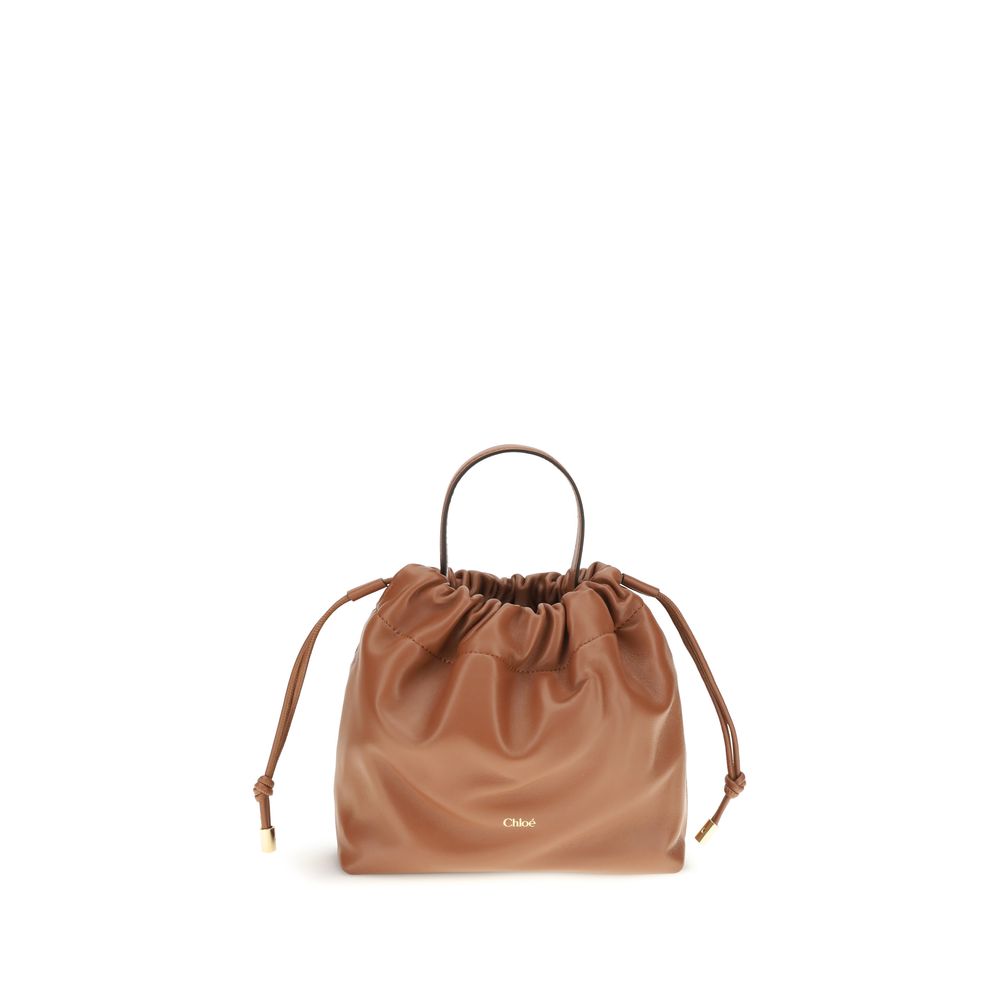 Shoulder Drawstring Bag by Chloé for women in lamb leather brown features a stately silhouette, showcasing a secure drawstring, ample , and stately shoulder-strap & handle for a stately finish.