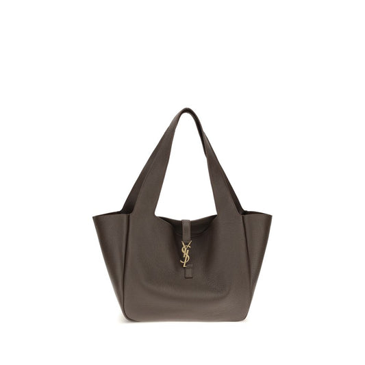 Shoulder Flap Bag by Saint Laurent for women in bos taurus calf leather & polyurethane brown presents a statuesque silhouette, showcasing a secure flap and statuesque single-compartment with versatile shoulder-strap for a sophisticated look.