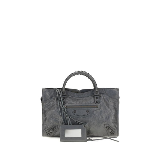 This Medium Handbag by Balenciaga for women in leather & cotton and gray presents a sculptural silhouette featuring a secure zipper, ample , and versatile shoulder-strap, adjustable-strap & handle for a sculptural finish.