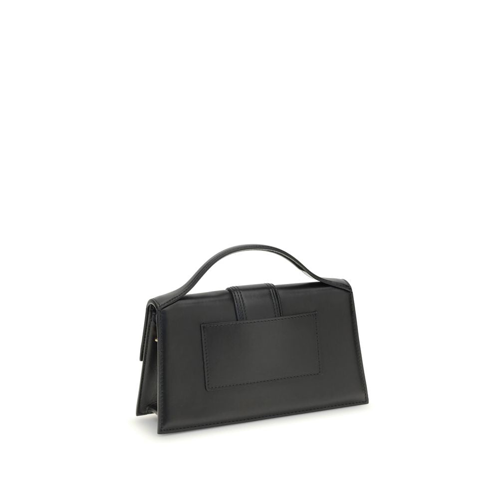 Large Flap Handbag by Jacquemus for women in bos taurus calf leather black presents a ornamental silhouette, showcasing a secure flap & magnetic, ample cardholder, and versatile shoulder-strap & handle for a ornamental finish.