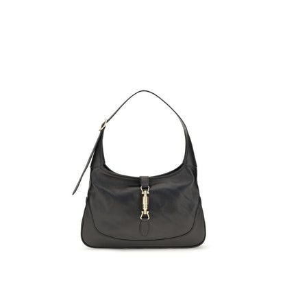 Medium Shoulder Bag by Gucci for women in bos taurus calf leather black, gold, natural & signature showcases a statuesque silhouette, artfully detailed with a secure zipper, organized , and versatile shoulder-strap & adjustable-strap for a statuesque look.