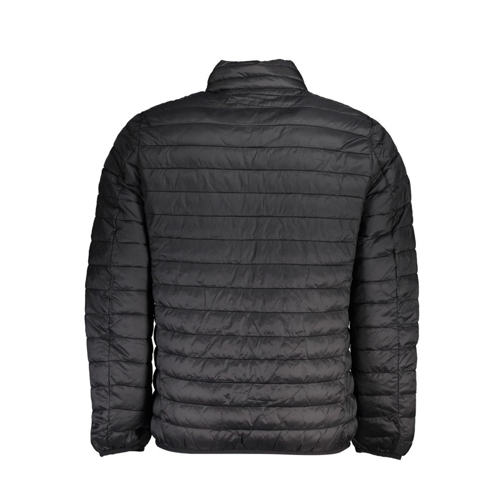 Windbreaker Jacket by Norway 1963 for men in polyamide black presents a resilient silhouette, artfully detailed with a sophisticated and functional lightweight, pockets & windproof for a resilient finish.
