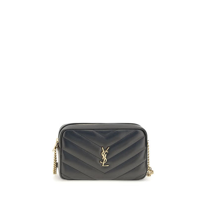 2-in-1 Shoulder & Crossbody Camera Bag by Saint Laurent for women in leather & cotton black, bronze & chevron features a stately silhouette, showcasing a secure zipper, ample , and stately crossbody-strap, shoulder-strap & adjustable-strap for a stately finish.