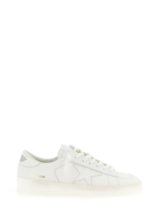 Sneakers by Golden Goose for men in cowhide leather gold, white & print presents a on trend silhouette from the Men's Low Top Cowhide Leather Sneakers collection, showcasing a on trend low-top style for an elevated aesthetic.
