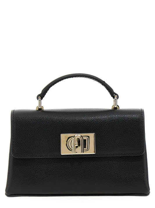 Mini 2-in-1 Shoulder & Crossbody Flap Handbag by Furla for women in leather & metal black features a versatile chic silhouette, meticulously detailed with a secure flap, ample , and versatile crossbody-strap, shoulder-strap & handle.