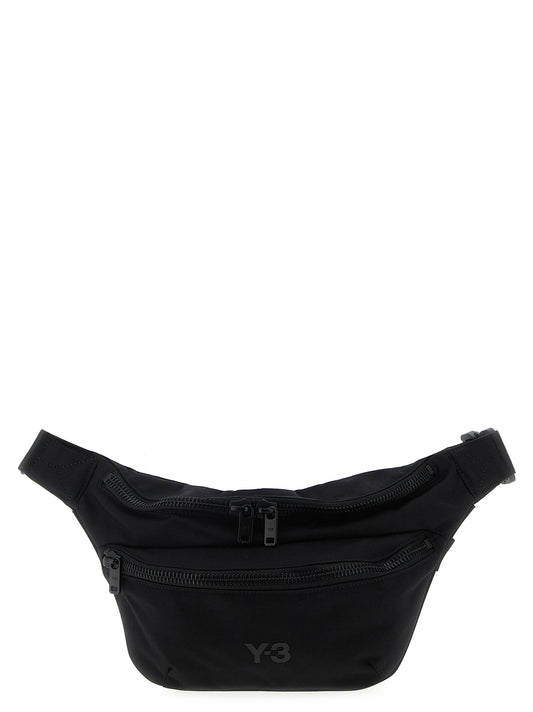 Crossbody Fanny Pack Handbag by Y-3 for unisex in polyamide black features an multi-faceted design with a secure zipper, ample , and versatile crossbody-strap, shoulder-strap & adjustable-strap for a multi-faceted finish.