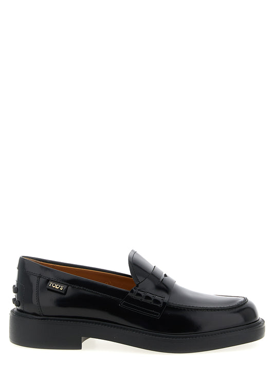 This Flat Loafer Slip-On Shoes by Tod's for women in bos taurus calfskin leather gradient & black features an exquisite silhouette from the Gommini Women's Bos Taurus Calfskin Leather Flat Loafer Slip-On Shoes collection, defined by a sophisticated flat and elegant .