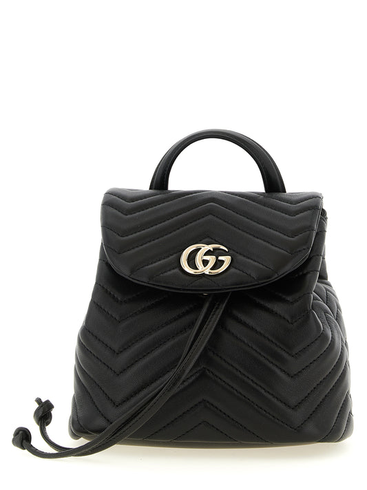 Medium Drawstring Backpack by Gucci for women in viscose & lamb leather black, patterned, chevron & signature features a effortlessly chic Gg Marmont Viscose & Lamb Leather Medium Drawstring Backpack design, showcasing a secure flap, drawstring & magnetic, ample , and versatile backpack-strap & adjustable-strap for a effortlessly chic finish.