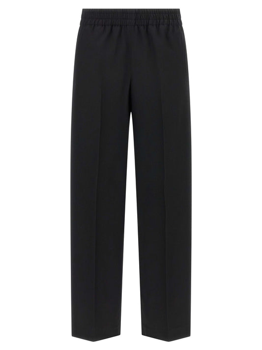 Trousers by Golden Goose for women in virgin wool black presents a smart silhouette, meticulously detailed with a smart straight-leg, a smart long, and a smart .