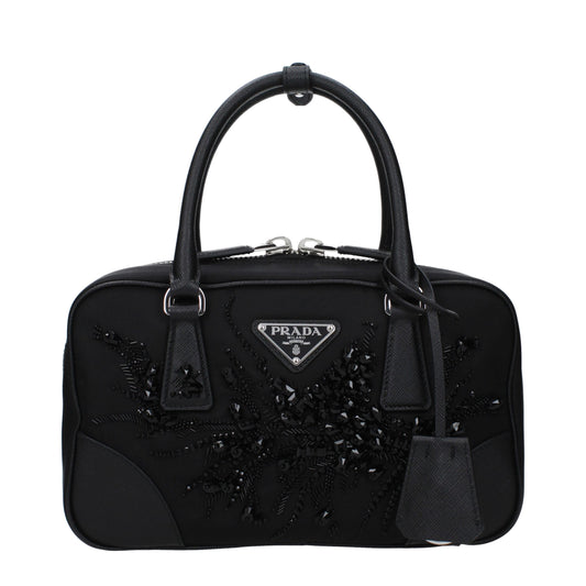Small Handbag by Prada for women in rubber & fabric black & silver features a exquisite silhouette, showcasing a secure zipper and exquisite internal-pockets with versatile shoulder-strap, adjustable-strap & handle for a exquisite finish.